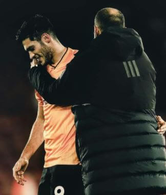 Sandra husband Nuno Espirito Santo embracing Wolverhampton striker Raul Jimenez for his record breaking performance.